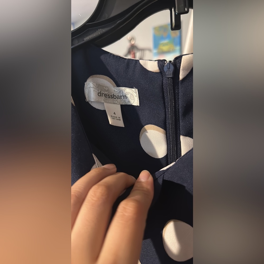 Polka dot blue dress.